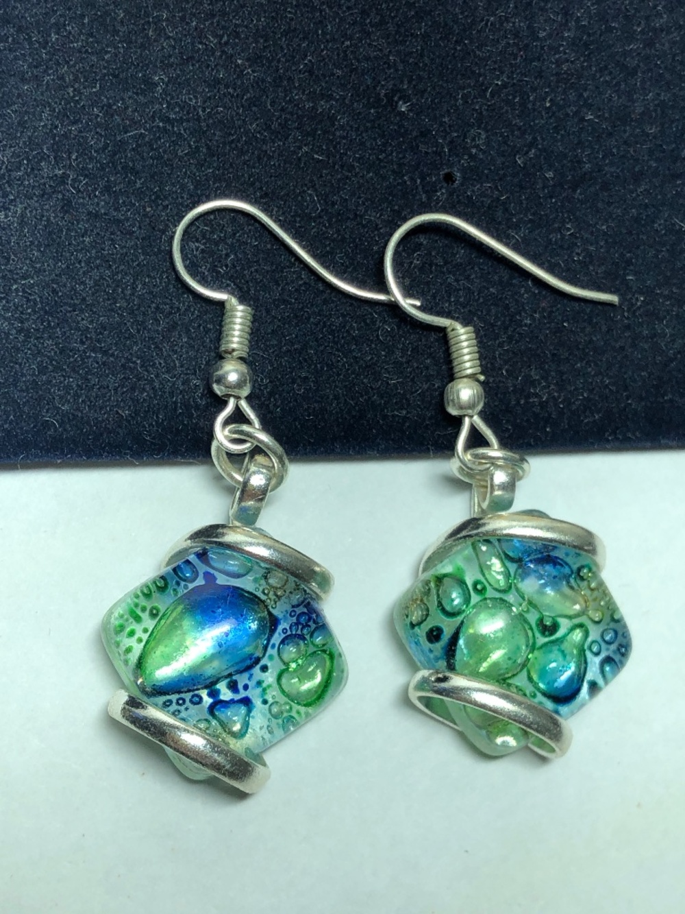 Blue art glass dangling earrings silver tone